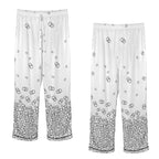 ANTIBrand white satin pajamas with black skull print