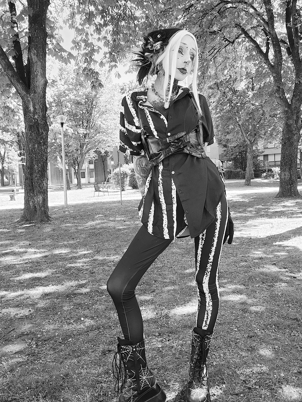 ANTIBrand White Stripes Done Right Duality Leggingson Valantinescorpse in a park black and white