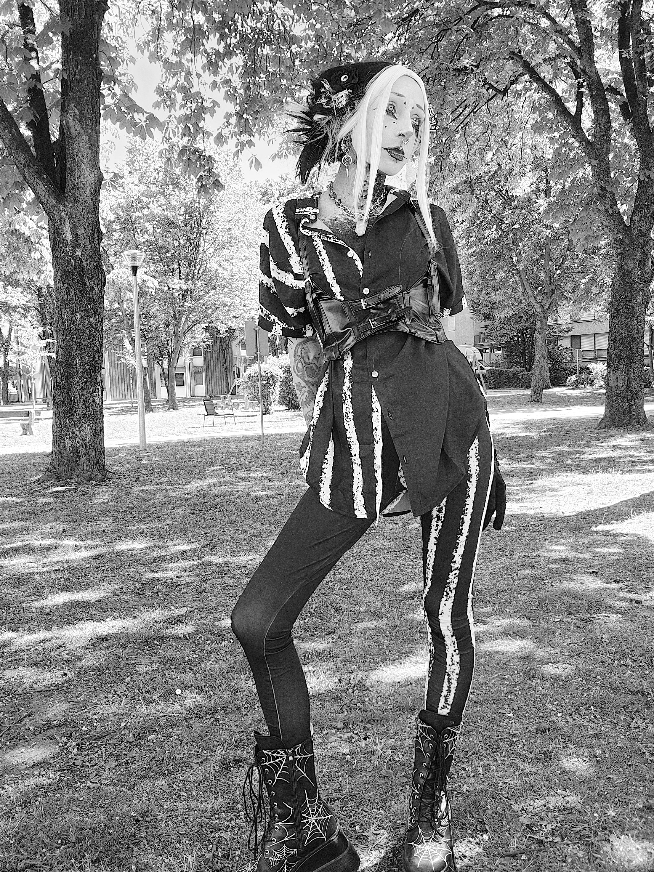 ANTIBrand White Stripes Done Right Duality Leggingson Valantinescorpse in a park black and white